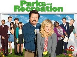 Parks and Recreation is an American political satire television sitcom created by Greg Daniels and Michael Schur. The series aired on NBC from April 9, 2009 to February 24, 2015, for 125 episodes, over seven seasons.[2][3][4][5] The series stars Amy Poehler as Leslie Knope, a perky, mid-level bureaucrat in the Parks Department of Pawnee, a fictional town in Indiana. The ensemble and supporting cast featured Rashida Jones as Ann Perkins, Paul Schneider as Mark Brendanawicz, Aziz Ansari as Tom Haverford, Nick Offerman as Ron Swanson, Aubrey Plaza as April Ludgate-Dwyer (née Ludgate), Chris Pratt as Andy Dwyer, Adam Scott as Ben Wyatt, Rob Lowe as Chris Traeger, Jim O'Heir as Garry 